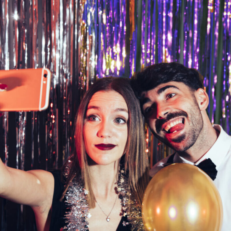 happy-couple-taking-selfie-new-years-party