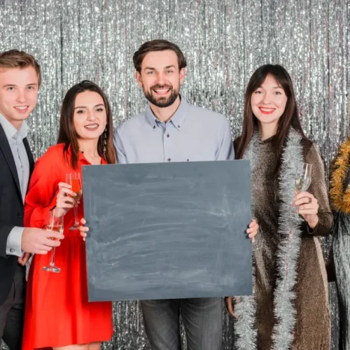 people-festive-outfit-holding-champagne-flutes