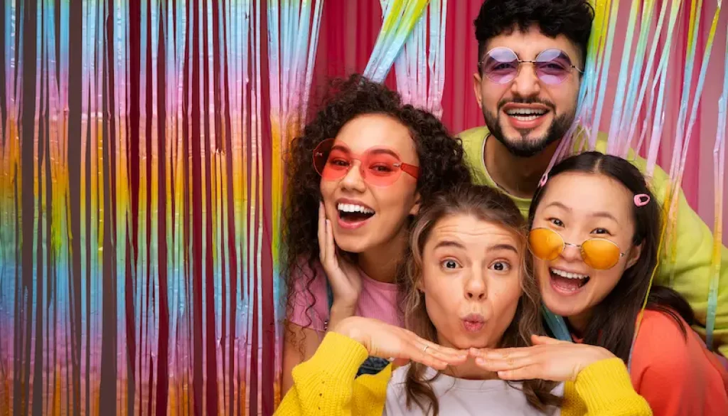 medium-shot-friends-posing-photo-booth Photo booth rental cost